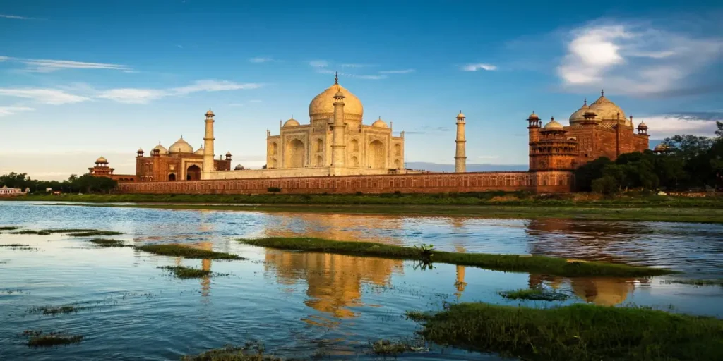 Agra Travel Guide: Must see spots and things to do 10 The Taj Mahal, reflecting in the Yamuna River, captured during an India Group Tour as part of the Agra Trip Package for our guests.
