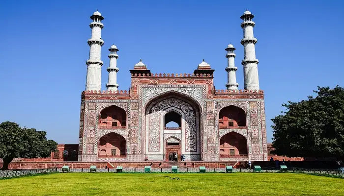 Agra Travel Guide: Must see spots and things to do 8 The grand entrance of Akbar’s Tomb in Sikandra, a must-visit site on our India Group Tour as part of the Agra Trip Package.